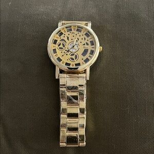 Gold Skeleton Dial Watch